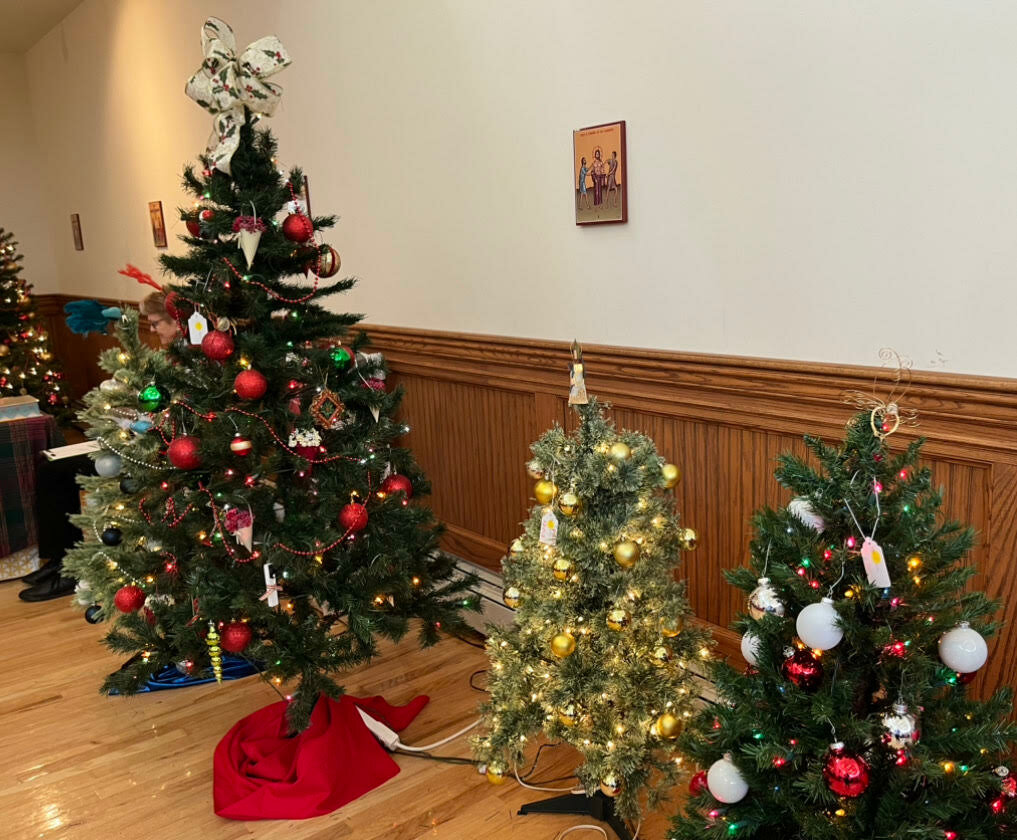 People could buy one-of-a-kind Christmas trees and decorative wreaths on the church’s main level.